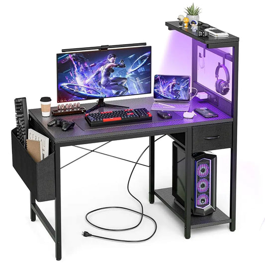 40" Gaming Desk with Power Outlet & LED Lights โ Compact Computer Desk with Reversible Shelves & Storage Drawer